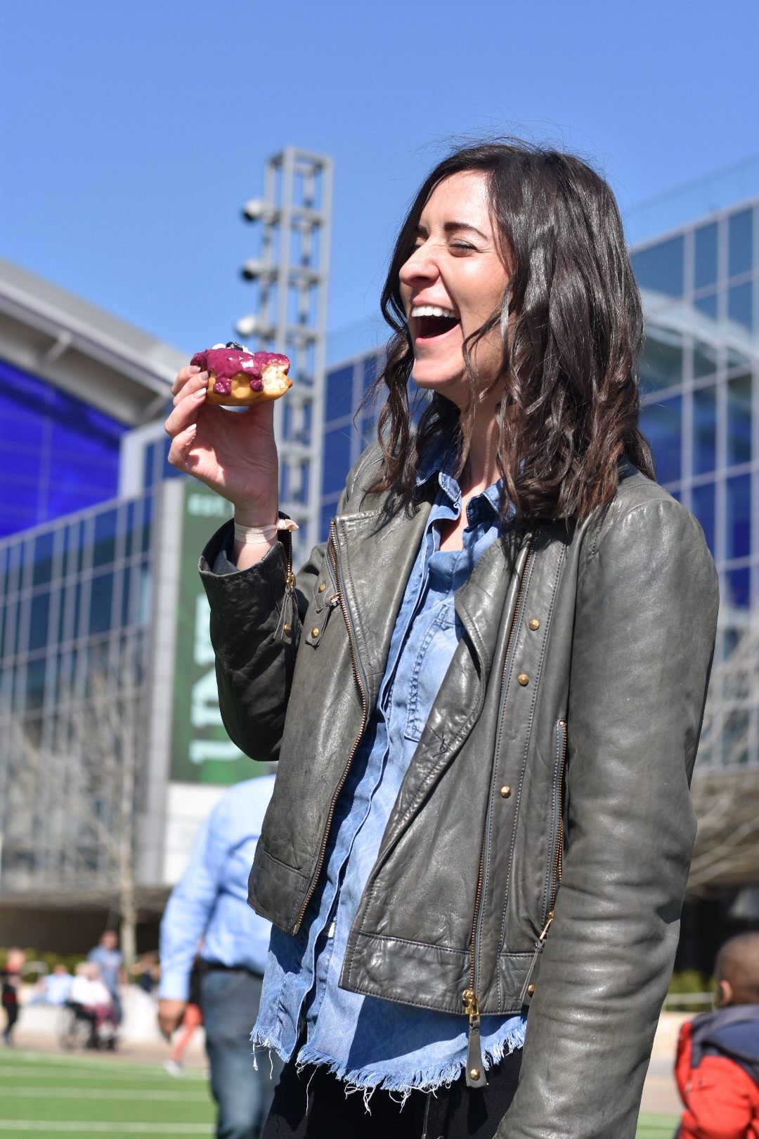 Rory laughing with a donut