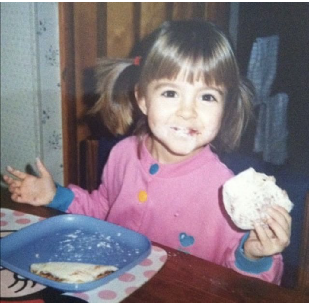 stillcutedough eating donuts in pigtails as a toddler