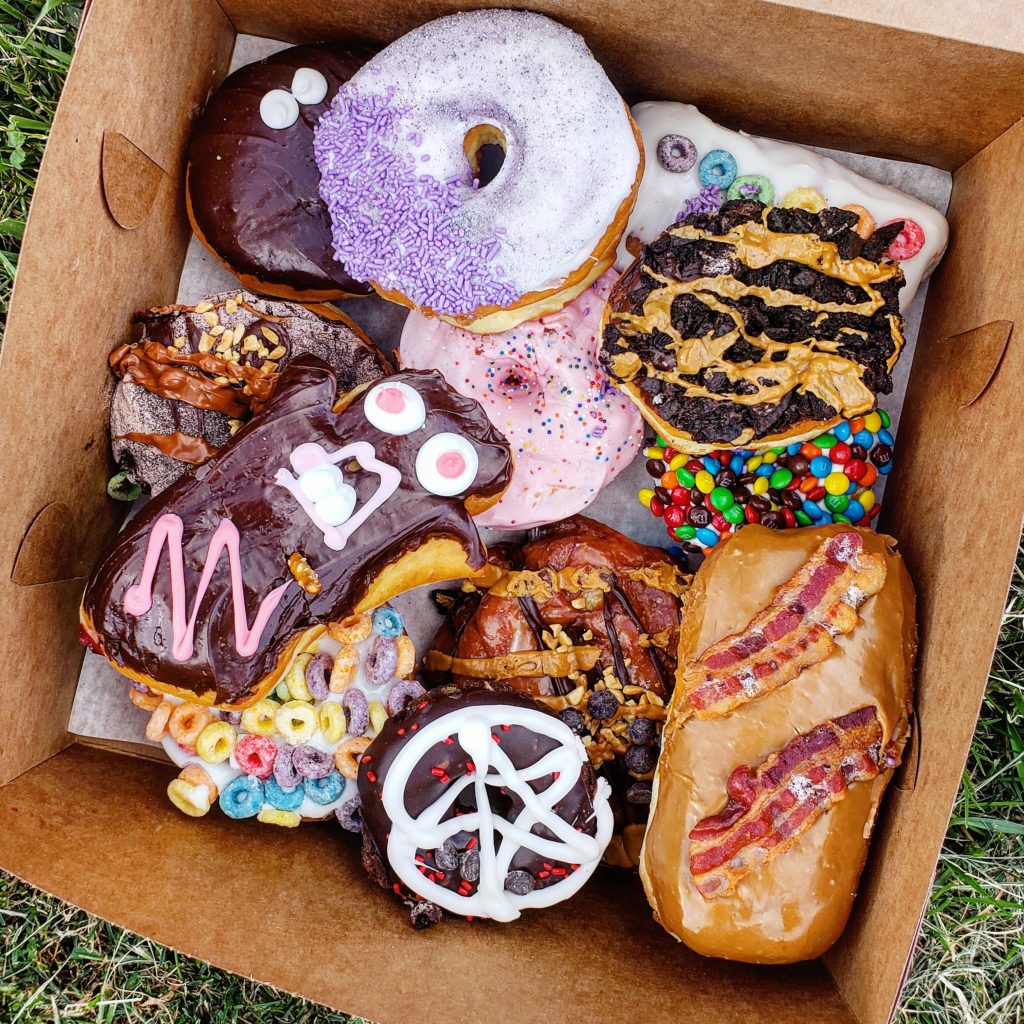 Assorted box of Voodoo Doughnuts by Erin Good
